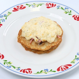 Драники под "шапкой" с ветчиной и грибами